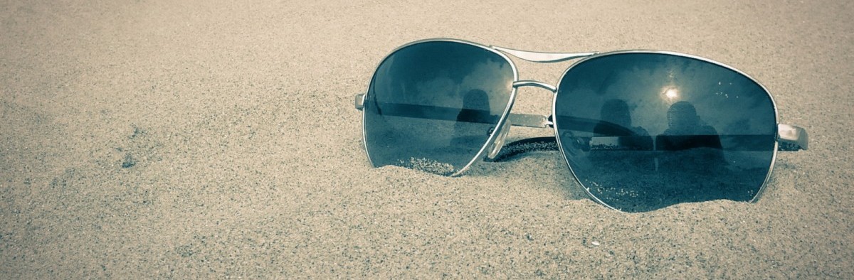 macro-of-sunglasses-1-1200x394-min